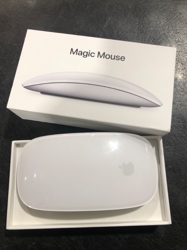 Photo 2 of Apple Magic Mouse: Wireless, Bluetooth, Rechargeable. Works with Mac or iPad; Multi-Touch Surface - White
