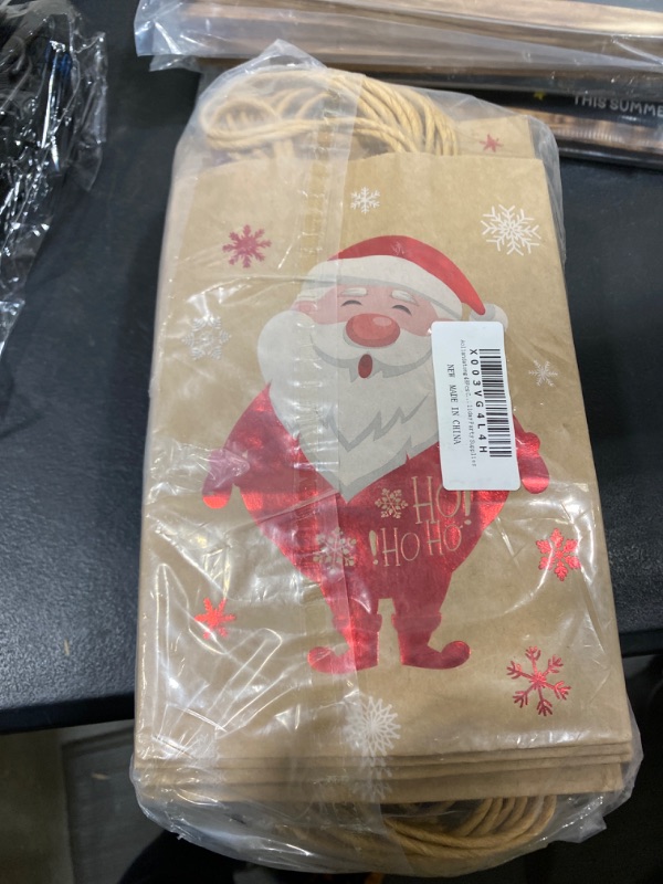 Photo 1 of Aoliandatong 48Pcs Christmas Kraft Gift Bags, Christmas Paper Bags with Handle Christmas Treat Party Favor Bags for Christmas Gift Wrapping and Holiday Party Supplies, 8.27"x5.9"x3.1"