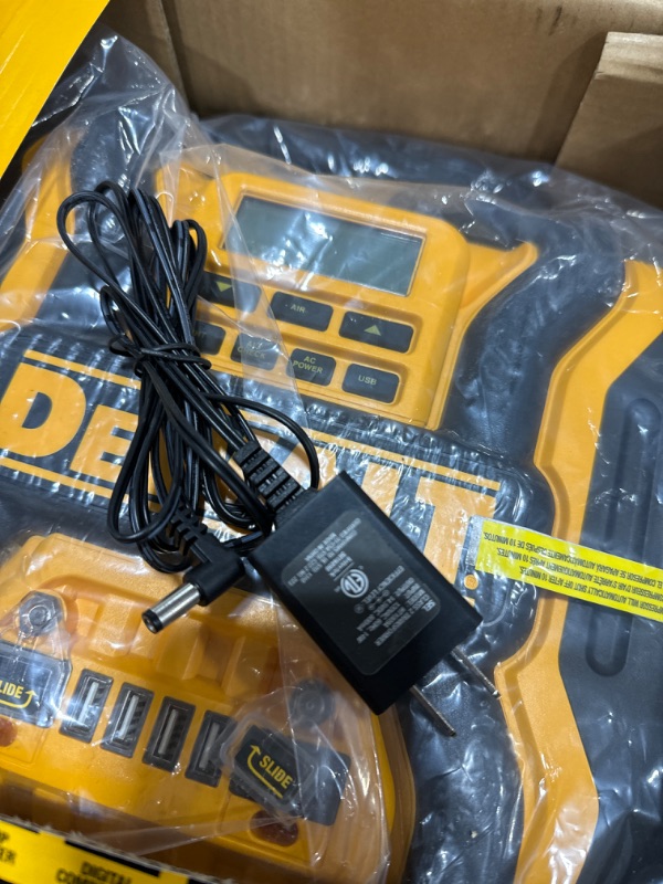 Photo 3 of DEWALT DXAEPS14 1600 Peak Battery Amp 12V Automotive Jump Starter/Power Station with 500 Watt AC Power Inverter, 120 PSI Digital Compressor, and USB Power , Yellow