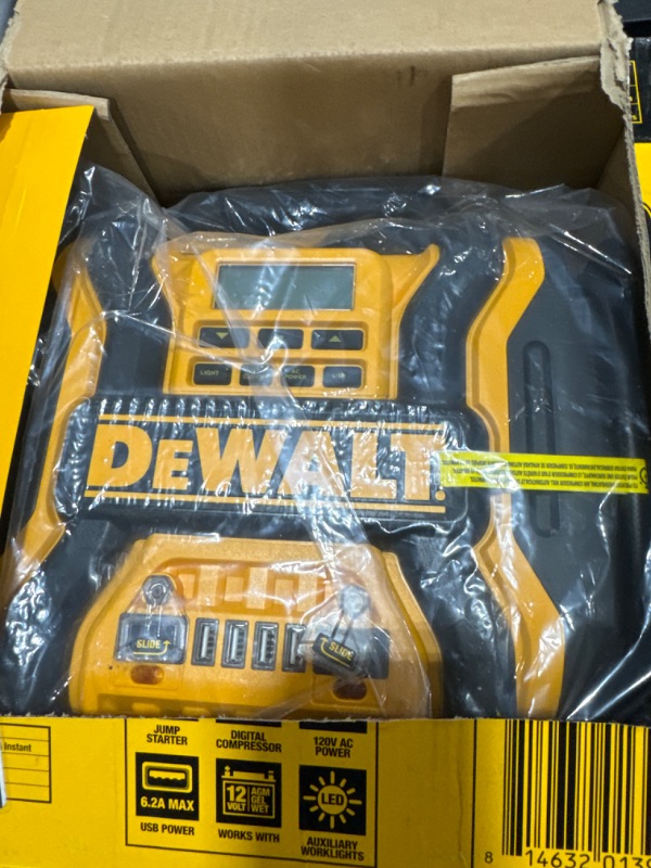 Photo 2 of DEWALT DXAEPS14 1600 Peak Battery Amp 12V Automotive Jump Starter/Power Station with 500 Watt AC Power Inverter, 120 PSI Digital Compressor, and USB Power , Yellow