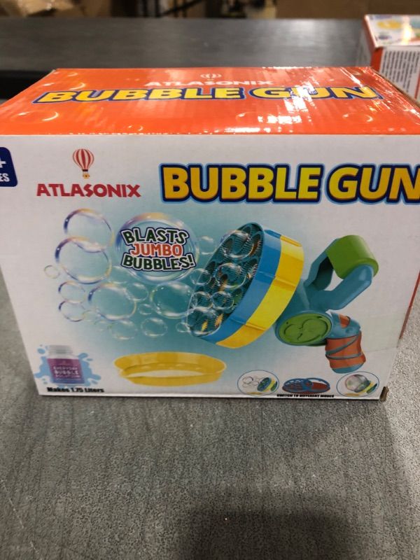 Photo 2 of Atlasonix Bubble Gun with Bubble Solution (60 oz), Bubble Blower for Kids - Bubble Guns for Toddlers, Bubble Toys, Bubble Blaster, Bubble Blaster, Bubble Blower for Toddlers