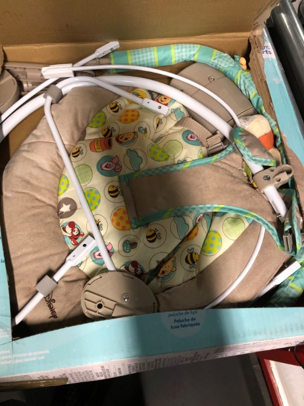 Photo 3 of Bright Starts Winnie the Pooh Dots & Hunny Pots Baby Bouncer with Vibrating Infant Seat, Music & 3 Playtime Toys, 23x19x23 Inch