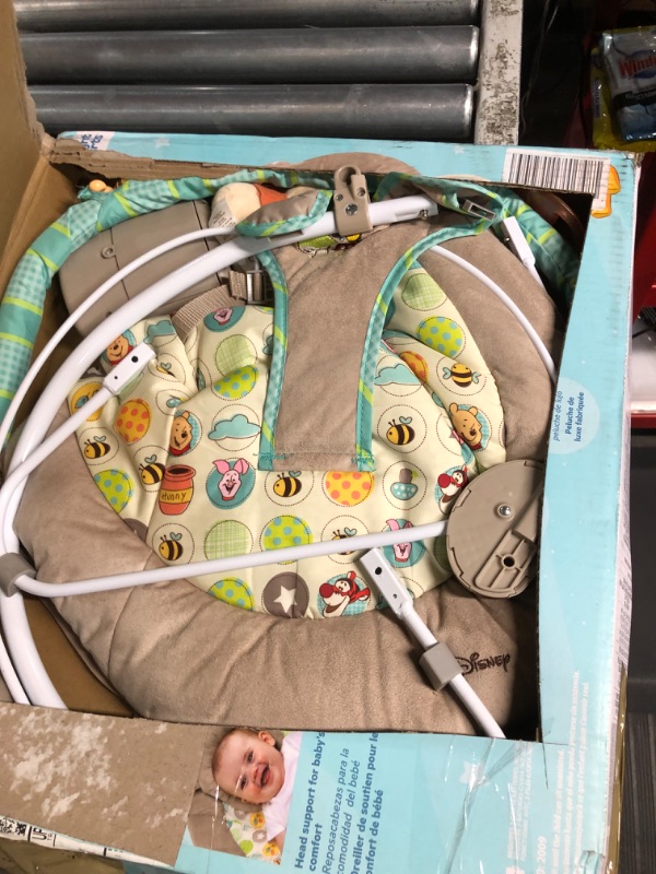 Photo 1 of Bright Starts Winnie the Pooh Dots & Hunny Pots Baby Bouncer with Vibrating Infant Seat, Music & 3 Playtime Toys, 23x19x23 Inch