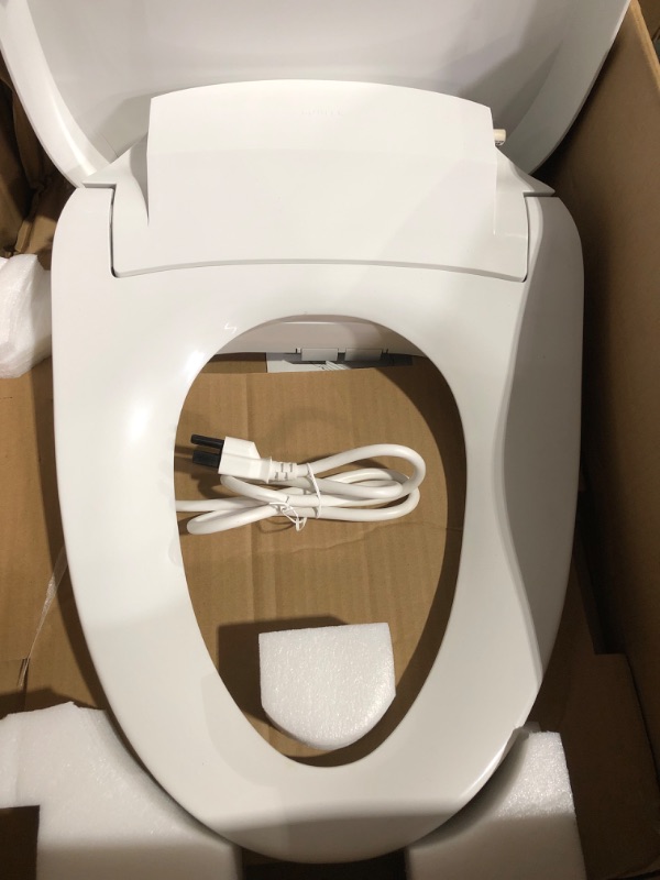 Photo 2 of * used * damaged * see images *
KOHLER Elongated Heated Bidet Toilet Seat