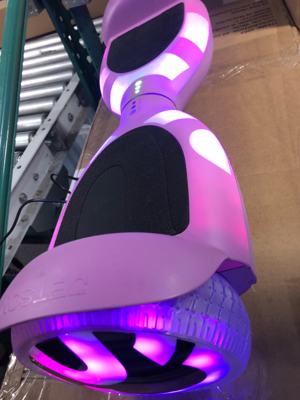 Photo 2 of ***PARTS ONLY/NON-RETURNABLE**DAMAGED**ONLY POWERS ON WHILE CHARGING***
Jetson All Terrain Light Up Self Balancing Hoverboard with Anti-Slip Grip Pads, for riders up to 220lbs Purple