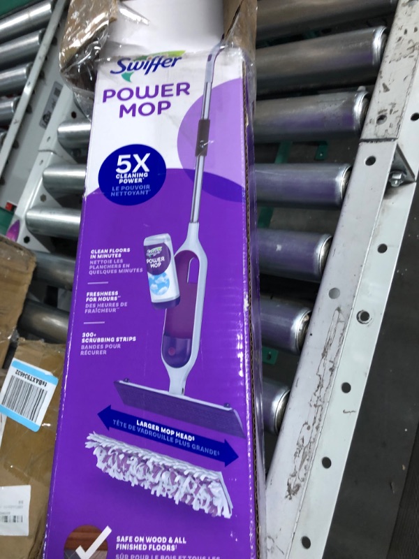 Photo 4 of **prev used**nonreturnable***Swiffer PowerMop Multi-Surface Mop Kit for Floor Cleaning, Fresh Scent, Mopping Kit Includes PowerMop, 2 Mopping Pad Refills, 1 Floor Cleaning Solution with Fresh Scent and 2 Batteries