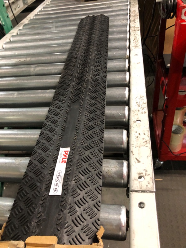 Photo 1 of Durable Cable Protection Ramp Cover - Supports 11000lbs Single Channel Heavy Duty Hose and Cord Track Floor Protection, 39.4” x 5.11” x 0.78” Cable Concealer for Indoor Outdoor Use - Pyle PCBLCO101BK