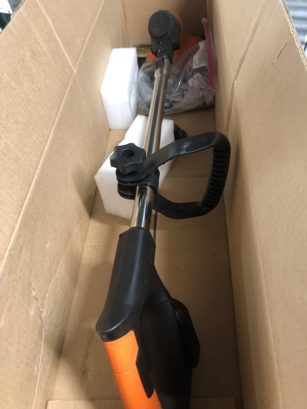 Photo 1 of ***USED - BLADE DAMAGED - SEE PICTURES***
Weed Trimmer, Orange, Battery Powered