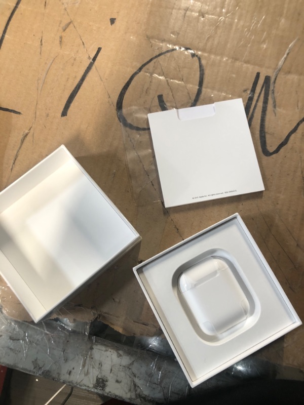 Photo 3 of Apple AirPods with Charging Case (Latest Model)