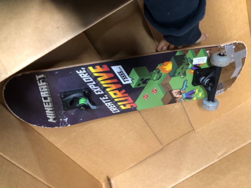 Photo 2 of * major damage * see images *
Minecraft 31 inch Skateboard, 9-ply Maple Deck Skate Board for Cruising, Carving, Tricks and Downhill Survive