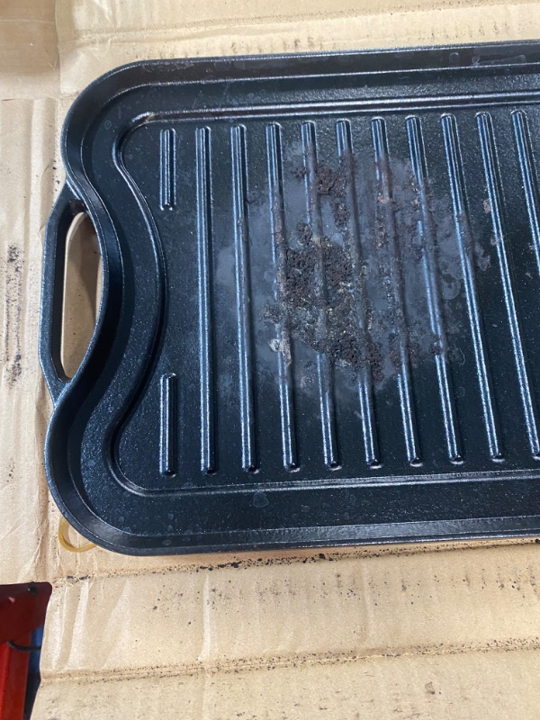 Photo 4 of **READ NOTES, MINOR DAMAGE**
Amazon Basics Pre-Seasoned Cast Iron Reversible Grill/Griddle