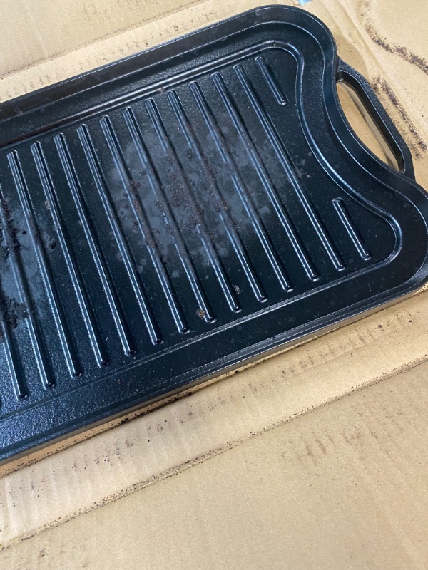 Photo 3 of **READ NOTES, MINOR DAMAGE**
Amazon Basics Pre-Seasoned Cast Iron Reversible Grill/Griddle