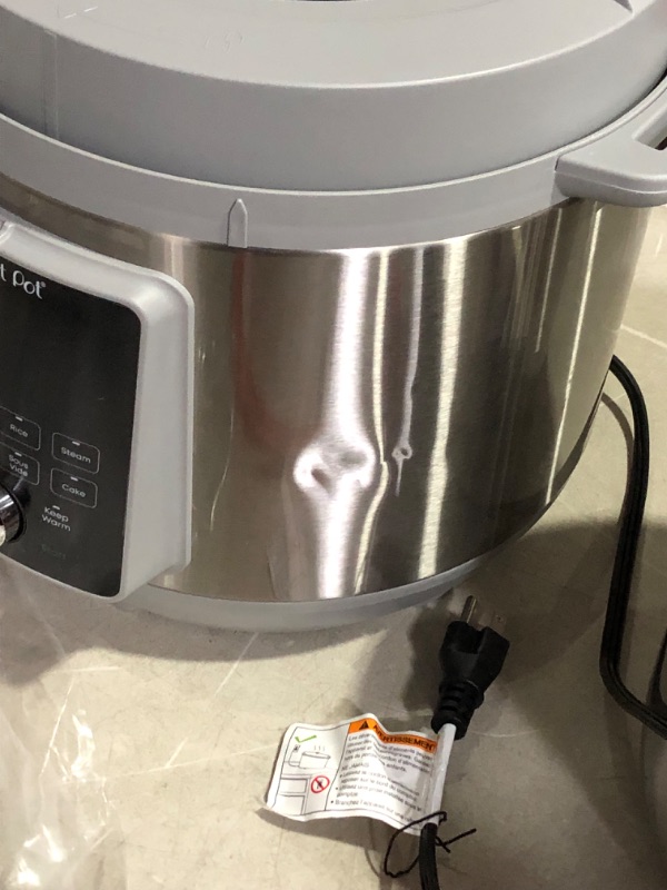 Photo 5 of ***USED  DAMAGED - DENTED - POWERS ON - UNABLE TO TEST FURTHER - SEE PICTURES***
Instant Pot Duo Plus, 8-Quart Whisper Quiet 9-in-1 Electric Pressure Cooker, Stainless Steel 8QT Duo Plus