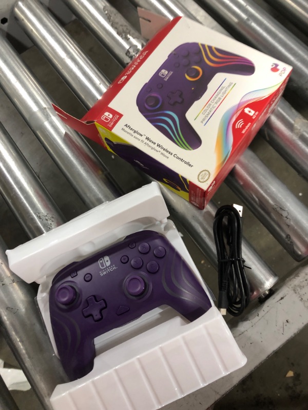 Photo 2 of PDP Afterglow™ Wave Enhanced Wireless Nintendo Switch Pro Controller, 8 Colors RGB LED, Dual Programmable Gaming Buttons, 40 Hour Rechargeable Battery Power, 30 Foot Connection, Officially Licensed by Nintendo: Purple Wireless Wave Purple