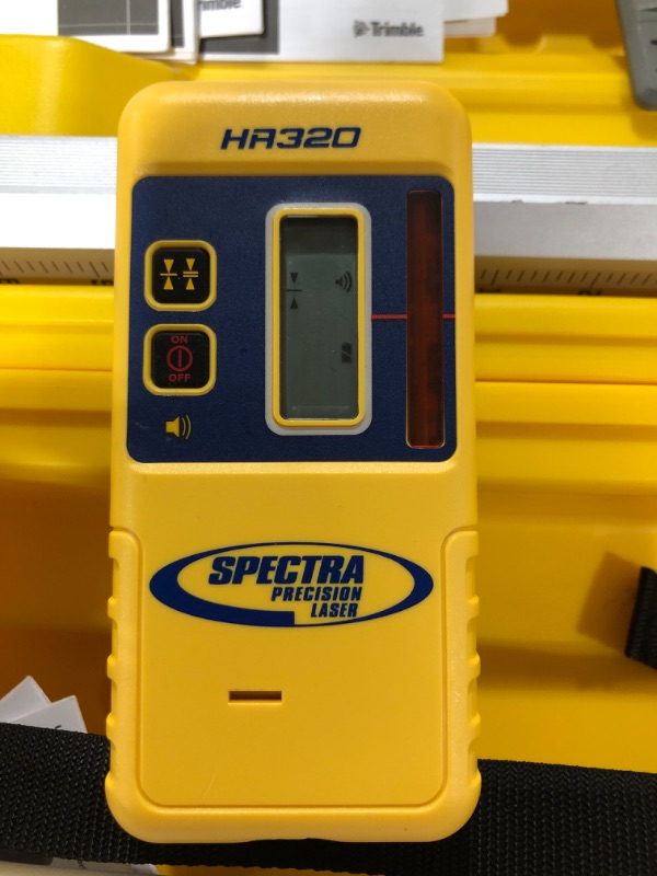 Photo 4 of Spectra Precision LL100N-2 Laser Level Kit with HR320 Receiver and Clamp, 15' Grade Rod (Inches), Tripod, and System Case , Yellow