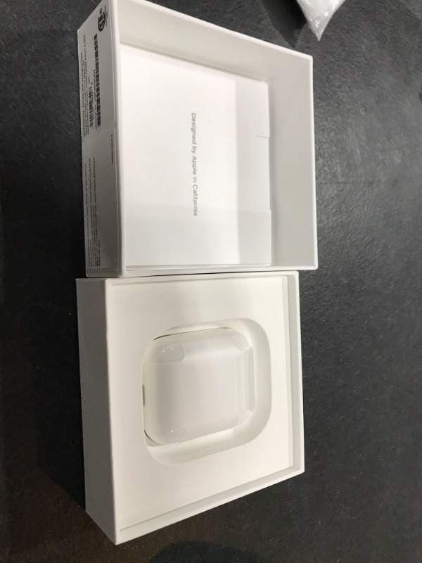 Photo 3 of Apple AirPods with Charging Case (Latest Model)