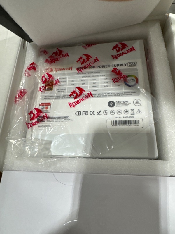 Photo 1 of Redragon PSU013 80+ Gold 650 Watt ATX Fully Modular Power Supply w/ 80 Plus Gold Certified, Compact 160mm Size and Low Noise RGB Fan 0 RPM, 100% Japanese Capacitors, Full Mod Cables, White ATX Gold WT 650 Watts