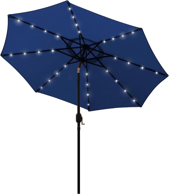 Photo 1 of Blissun 9 ft Solar Umbrella 32 LED Lighted Patio Umbrella Table Market Umbrella with Tilt and Crank Outdoor Umbrella for Garden, Deck, Backyard, Pool and Beach (Navy Blue)
