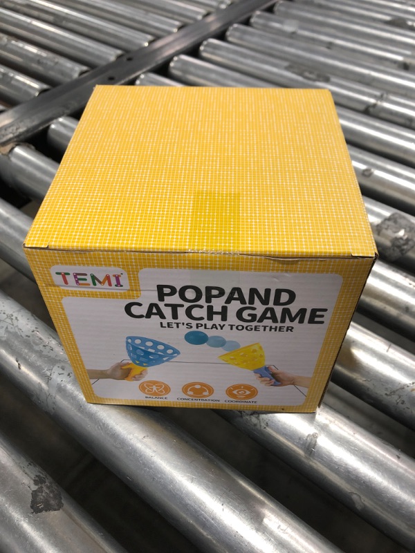 Photo 2 of TEMI Pop Pass Catch Ball Game with 4 Catch Launcher Baskets and 20 Balls, Beach Toys Backyard Outdoor Indoor Game Age 3 4 5 6 7 8 9 10+ Years Old Boys Girls Kids Adults Family Christmas Easter Gifts
