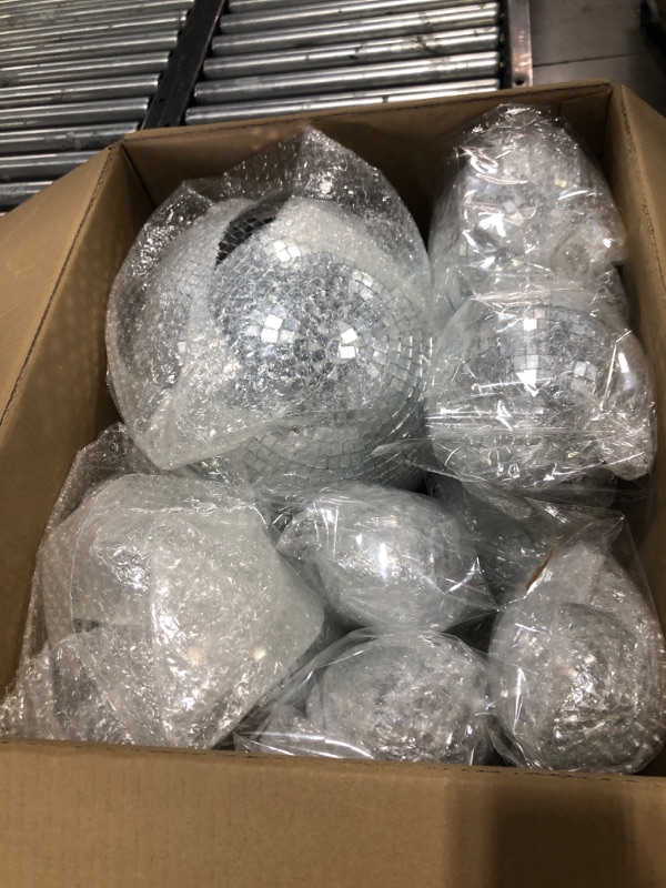 Photo 2 of Libima 12PCS Mirror Disco Balls Ornaments Silver Disco Ball Hanging Decoration Different Size 70s Disco Themed Party Decoration for Christmas Dance Music Stage Bar Party Supplies (12'', 8'', 6'', 4'')