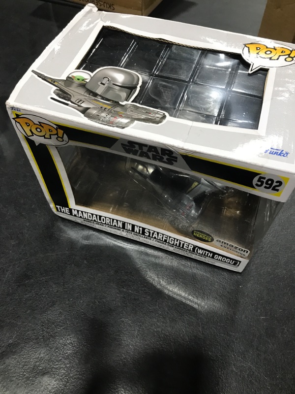 Photo 2 of Funko Pop! Ride Super Deluxe: Star Wars Hyperspace Heroes - The Mandalorian in N1 Starfighter (with Grogu), Amazon Exclusive