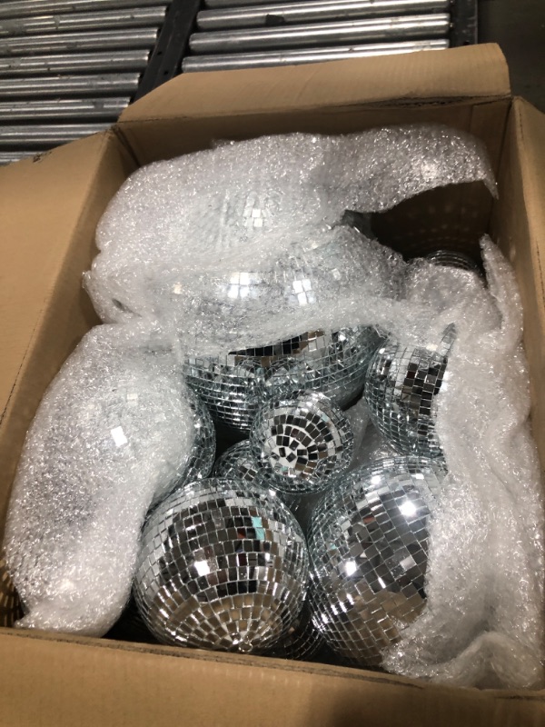 Photo 2 of Libima 12 Pack Disco Ball Bulk Large Hanging Disco Ball Party Decorations Different Sizes Small Mirror Ball Decorations for Stage Bar Wedding Festivals Party Decorations(12'', 8'', 6'', 4'')
