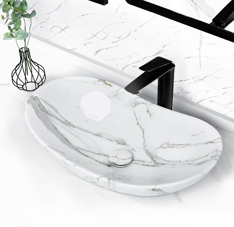 Photo 1 of Tysun Oval Vessel Sink - 24" x 14" Boat Shape Bathroom Vessel Sink Modern Above Counter White Porcelain Ceramic Bathroom Vanity Vessel Sink Bowl Art Basin with Pop-Up Drain 