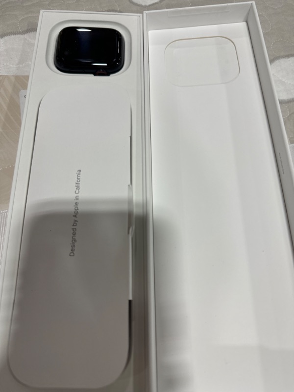 Photo 1 of Apple Watch Series 9 GPS + Cellular 45mm Aluminum Case Sport Band - M/L in Midnight Blue | Smartwatch | Verizon (with Contract)
