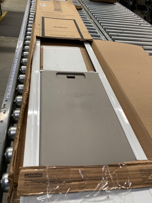 Photo 1 of PetSafe 1-Piece Sliding Glass Pet Door for Dogs and Cats - Adjustable Height 75 7/8" to 81"- Large, White, No-Cut DIY Install, Aluminum Patio Panel Insert, Great for Renters or Seasonal Installation 1-Piece Sliding Door White Large