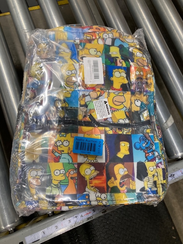 Photo 2 of *** BAG DESIGN VARIES *** Mad Engine Simpsons Character All Over Backpack One Size Multicolor