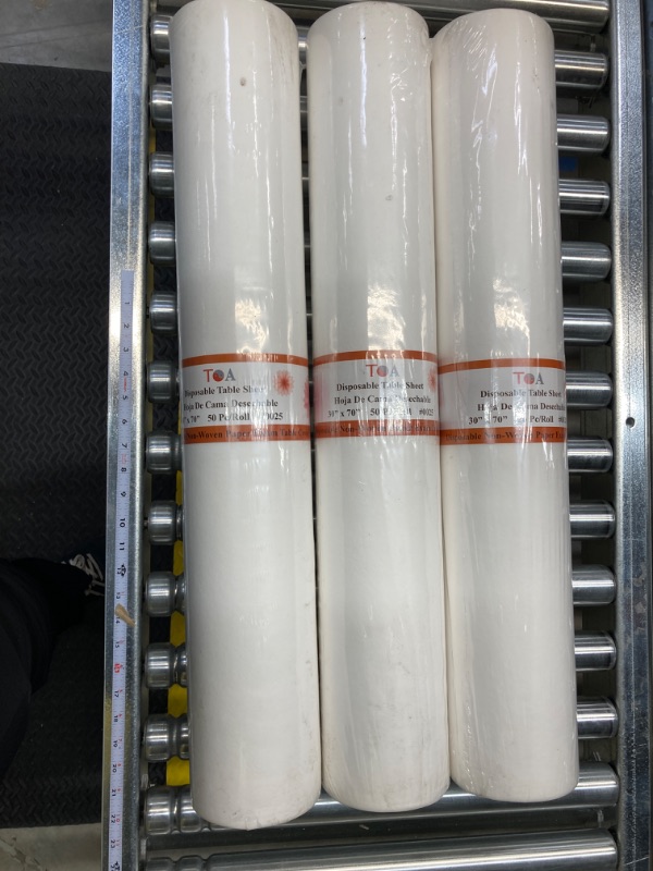 Photo 1 of TOA Supply 70.5"x30" 50 Sheet-1 Roll 6 Roll Case Disposable White Non-Woven Paper Exam Table Bed Cover