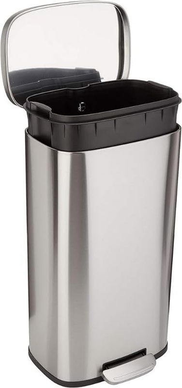 Photo 1 of Amazon Basics Smudge Resistant Rectangular Trash Can With Soft-Close Foot Pedal, Brushed Stainless Steel, 30 litre/7.9 Gallon, Satin Nickel Finish, 13.8"L x 11.8"W x 25"H