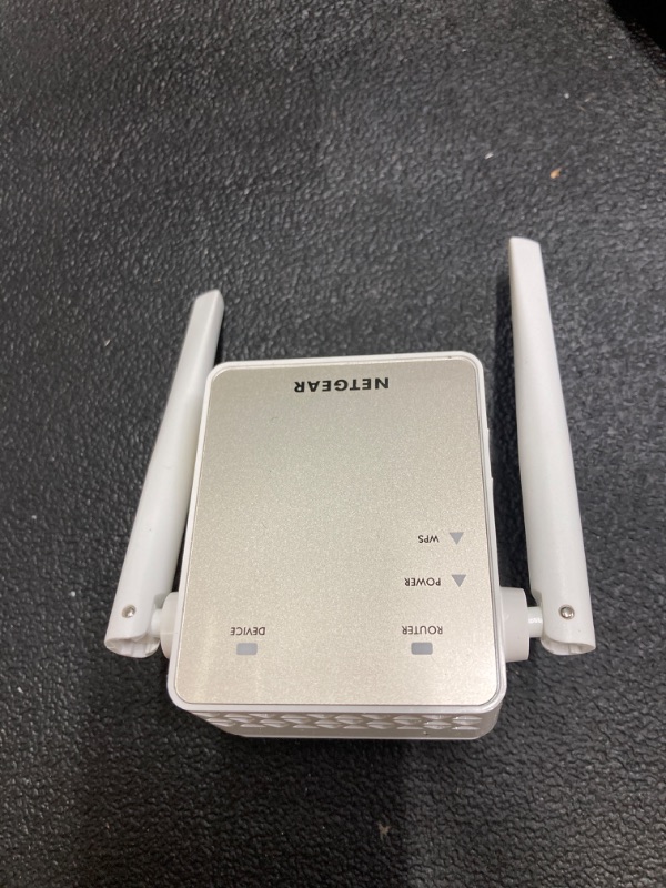 Photo 1 of NETGEAR Wi-Fi Range Extender EX6120 - Coverage Up to 1500 Sq Ft and 25 Devices with AC1200 Dual Band Wireless Signal Booster & Repeater (Up to 1200Mbps Speed), and Compact Wall Plug Design, White