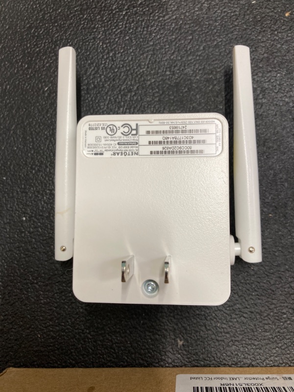 Photo 1 of NETGEAR Wi-Fi Range Extender EX6120 - Coverage Up to 1500 Sq Ft and 25 Devices with AC1200 Dual Band Wireless Signal Booster & Repeater (Up to 1200Mbps Speed), and Compact Wall Plug Design, White