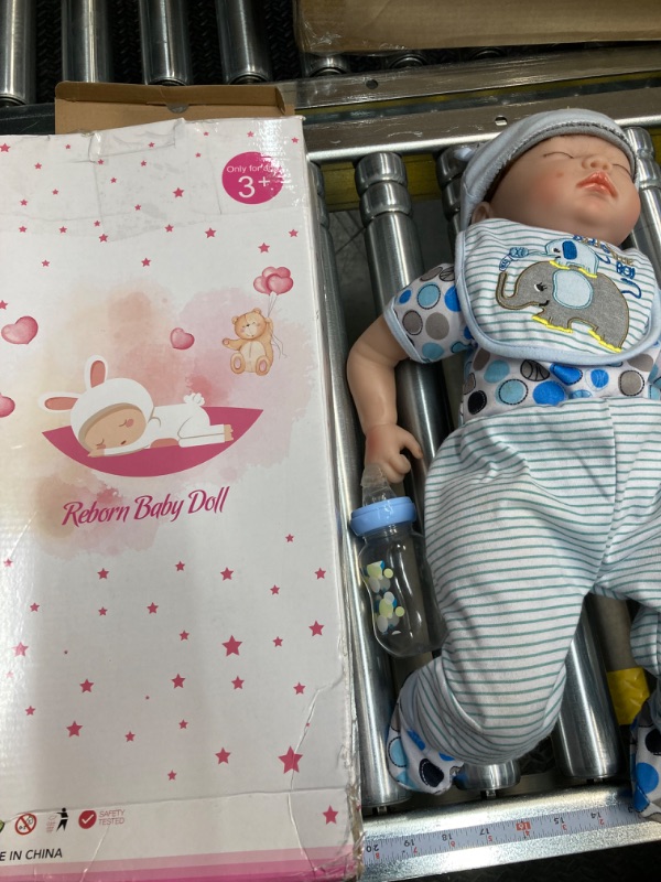 Photo 4 of Reborn Baby Dolls, 22 Inch Lifelike Newborn Baby Doll Boy, Realistic Sleeping Dolls That Look Real, Handmade Weighted Vinyl Christmas Reborn Gift Set for Kids Age 3+