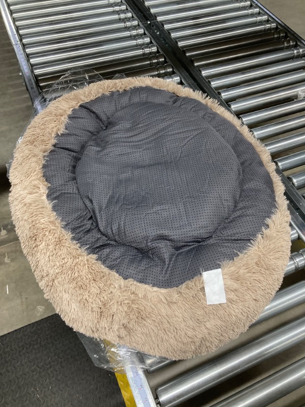Photo 1 of Bedsure Calming Dog Bed for Medium Dogs - Donut Washable Medium Pet Bed, 30 inches Anti Anxiety Round Fluffy Plush Faux Fur Cat Bed, Fits up to 45 lbs Pets, Camel 30x30x8 Inch (Pack of 1) Camel