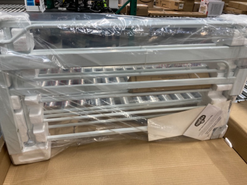 Photo 1 of BABY GATE WHITE
Regalo 56-Inch Extra WideSpan Walk Through Baby Gate, Includes 4-Inch, 8-Inch and 12-Inch Extension, 4 Pack of Pressure Mounts and 4 Pack of Wall Cups and Mounting Kit, White 56" Wide 