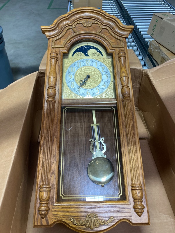 Photo 1 of ***DOES NOT WORK, SEE NOTES*** Howard Miller LaGrange Wall Clock II 547-444 – Golden Oak Home Decor with Brass Pendulum with Quartz Dual-Chime Movement