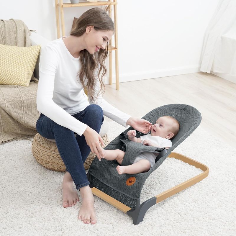 Photo 1 of Baby Bouncer Seat for Infants with Wood Accents - Newborn Bouncer for Babies 0-6 Months Up to 20 lbs - Portable Infant Bouncer - Baby Bouncer Chair - Bouncy Infant Seat with Removable Bar