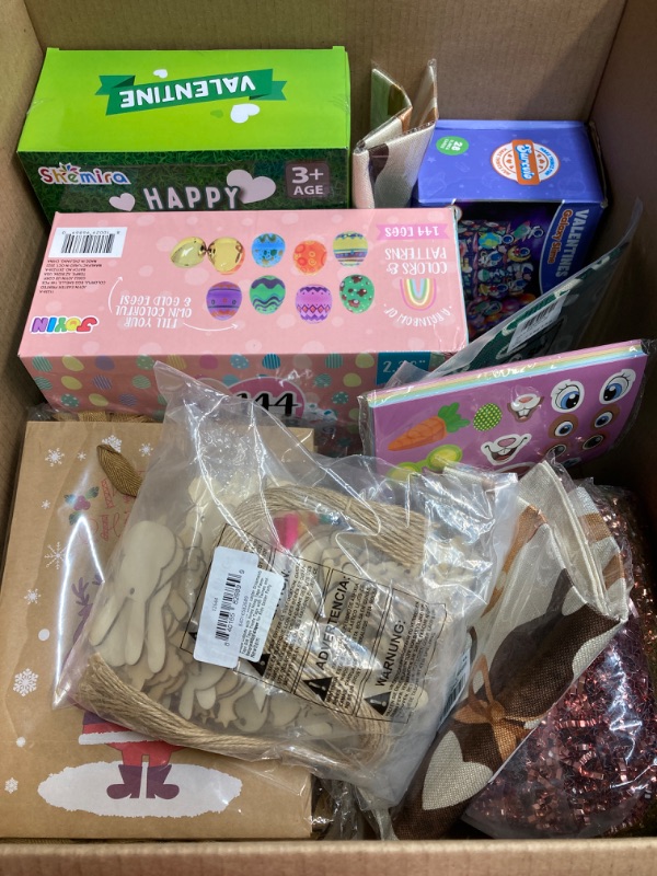 Photo 1 of BIG HOLIDAY BUNDLE: Galaxy slime, Easter eggs with gold eggs, Valentine cards and stress balls, Christmas bags, rose gold paper grass, 36 packs of stickers, yard flags, St. Patrick, coloring eastern ornaments