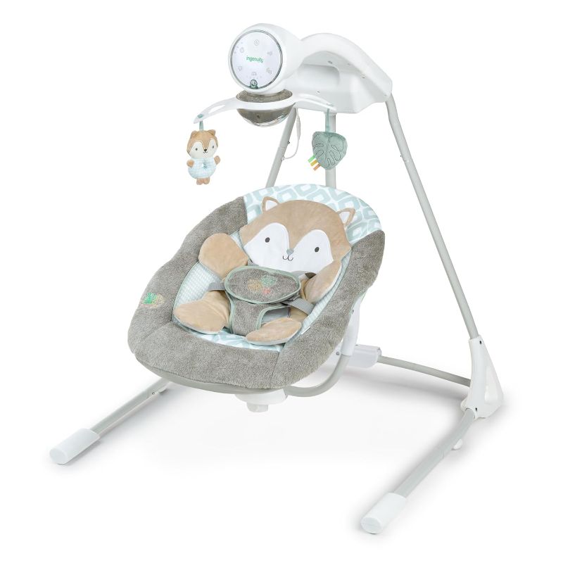 Photo 1 of Ingenuity InLighten 5-Speed Baby Swing - Swivel Infant Seat, 5 Point Safety Harness, Nature Sounds, Lights - Kitt Fox