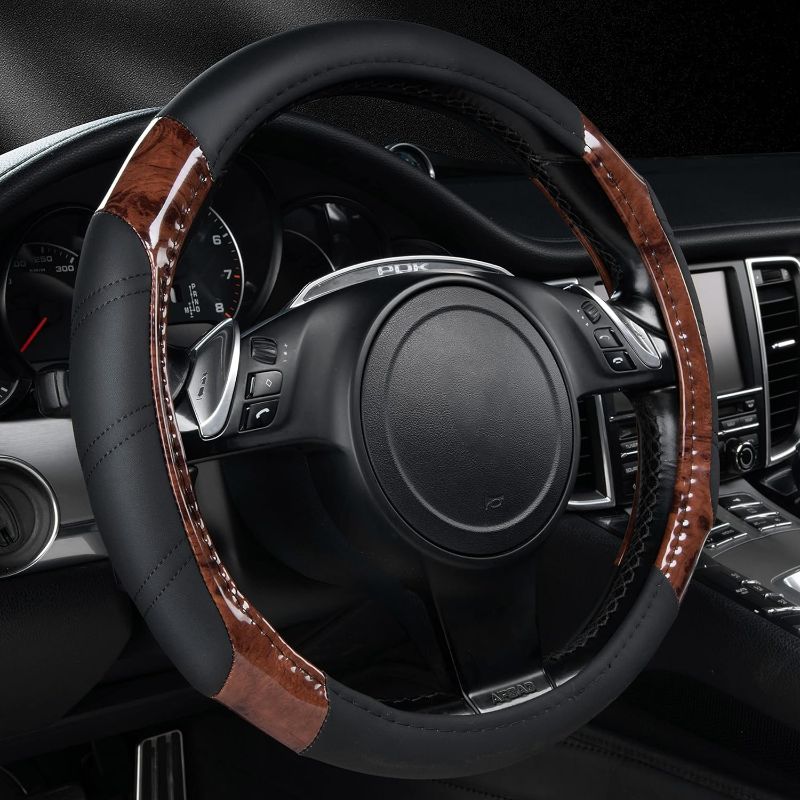 Photo 1 of CAR PASS Wood Grain Microfiber Leather Sporty 14.5-15 inch Steering Wheel Cover Universal Fits for 95% Truck,SUV,Cars, Anti-Slip Safety Comfortable Design (Black Wood Grain) https://a.co/d/hjDUNOc