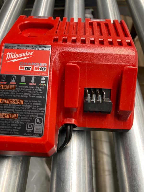 Photo 4 of Milwaukee 48-59-1808 M12 and M18 12 Volt/18 Volt Lithium-Ion Multi-Volatge Rapid Battery Charger (Non-Retail Packaging)