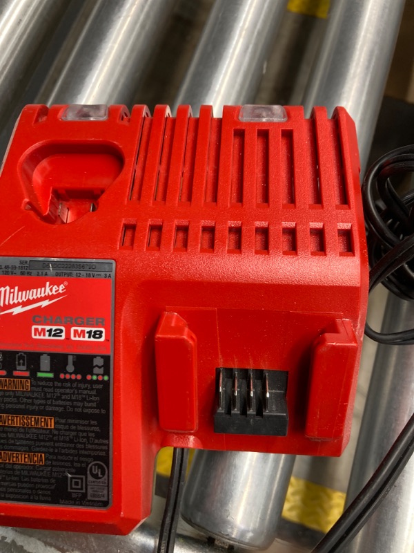 Photo 2 of 
Milwaukee 48-59-1808 M12 and M18 12 Volt/18 Volt Lithium-Ion Multi-Volatge Rapid Battery Charger (Non-Retail Packaging)