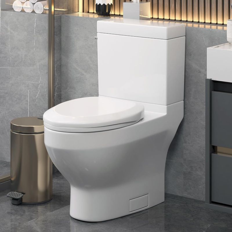 Photo 1 of 2-piece 1.1 GPF/1.6 GPF High Efficiency Dual Flush Complete Elongated Toilet in White, Seat Included