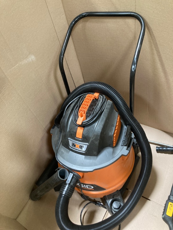 Photo 2 of ***EXTREMELY DIRTY/DUSTY*** 16 Gallon 6.5 Peak HP NXT Shop Vac Wet Dry Vacuum with Cart, Fine Dust Filter, Locking Hose and Accessories
