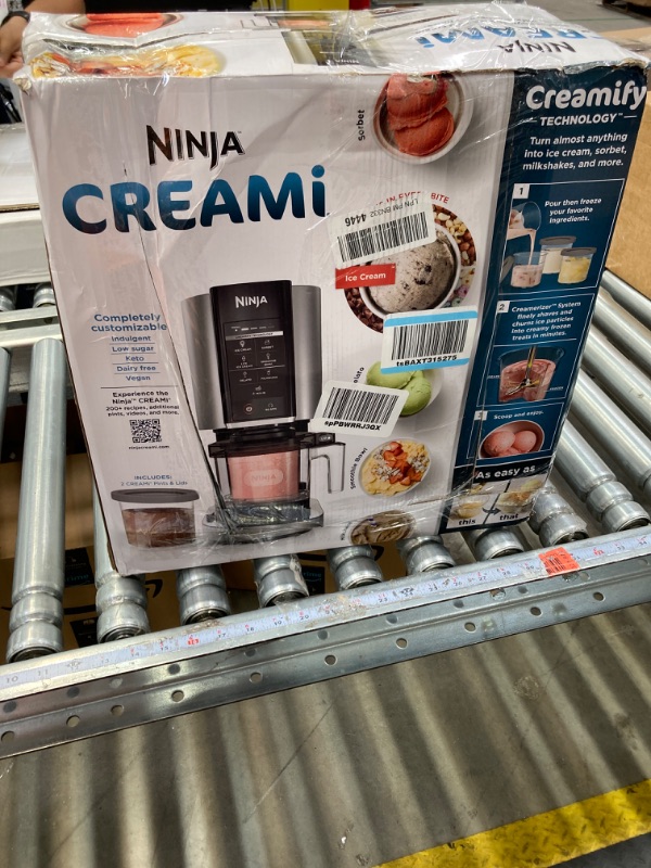 Photo 1 of Ninja NC301 CREAMi Ice Cream Maker, for Gelato, Mix-ins, Milkshakes, Sorbet, Smoothie Bowls & More, 7 One-Touch Programs, with (2) Pint Containers & Lids, Compact Size, Perfect for Kids, Silver (2) 16 oz. Pints