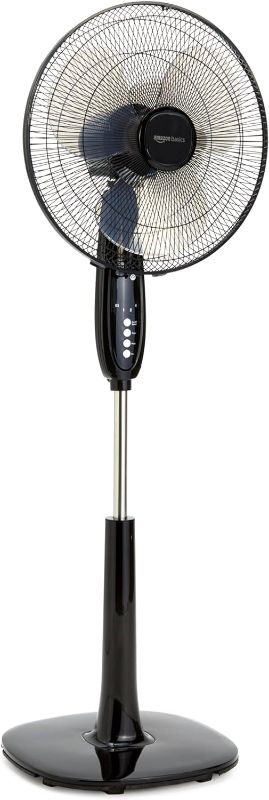 Photo 1 of Amazon Basics 16-Inch 3-Speed Pedestal Floor Fan, Standing Fan for Home, with Oscillating Dual Blades, AC Motor, With Remote Control, Timer, Tilted Head, Black