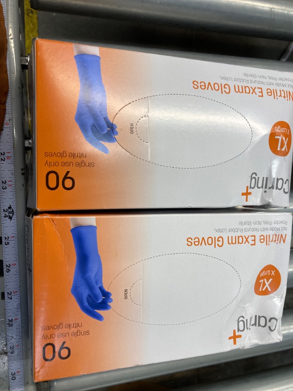 Photo 1 of ***BUNDLE (2 PACK)***

Caring Nitrile Exam Gloves, Blue, Powder-Free, Disposable Gloves for Medical Care, First Aid, Cleaning, Food Prep X-large (Pack of 90)