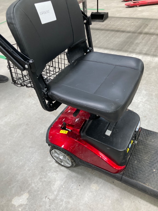 Photo 4 of 4-Wheel Mobility Scooter for Adults and Seniors - Long Range, Smart Safety Features, Rotating Seat, LED Headlights, All-Terrain, Travel-Friendly, Includes cup holder, rearview mirrors, and Two baskets
***Rear righthand tire damaged***